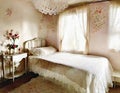 Watercolor of A cozy cottagecore bedroom adorned with a lace floral and vintage furniture for an enchanting
