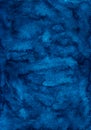Watercolor dark blue background texture. Vintage royal blue hand painted watercolour backdrop. Stains on paper