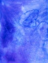 Watercolor deep blue-purple background. Stains on paper. Aquarelle royal purple liquid backdrop Royalty Free Stock Photo