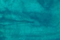 Watercolor deep turquoise background painting texture. Vintage teal blue hand painted backdrop. Stains on paper