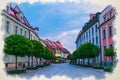 Watercolor drawing of Cobblestone street road with colorful multicolored buildings