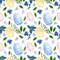 Watercolor Easter background. Seamless pattern with Easter eggs blue flowers, petals and green leaves and branches