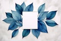 Watercolor elegance blue leaves, white paper, concrete backdrop, an artistic fusion