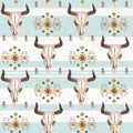 Watercolor ethnic boho seamless pattern of bull cow skull, horns & tribe ornament on blue background