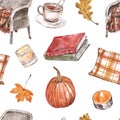 Watercolor fall mood seamless pattern. Cozy chair, tea, books, tree leaves, pumpkin on white background Royalty Free Stock Photo