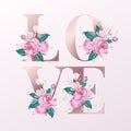 Rose gold love text lettering decorated with floral watercolor Royalty Free Stock Photo