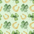 Watercolor green clover and golden horseshoes