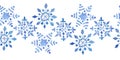 Watercolor hand drawn seamless horizontal border blue elegant snowflakes for Christmas new year design wrapping paper