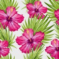 Watercolor hibiscus flower and palm leaves seamless pattern