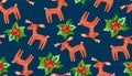 Watercolor holiday gingerbread deer and red berries with green leaves on dark blue seamless background texture. Cute