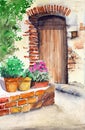 Watercolor illustration of the facade of an old house with a door under an arch