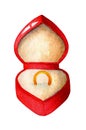 Watercolor illustration of a red velvet heart-shaped box with a gold ring inside. Royalty Free Stock Photo