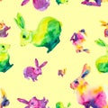 Watercolor illustration of sitting multicolor Easter bunnys. Seamless pattern isolated on yellow background