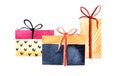 Watercolor image of three present boxes isolated on white background. Festive colorful gift packages tied with bright ribbons. Royalty Free Stock Photo