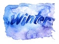 Watercolor inscription `Winter` on a blue watercolor background