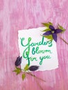 Watercolor lettering and dark violet clematis alpina flowers