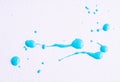 Watercolor light blue drop splash. Splattered of bright blue ink drops on white paper background. Sample of cosmetics. The puddle Royalty Free Stock Photo