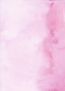 Watercolor light dusty pink background stains on paper. Pastel rose color ombre backdrop
