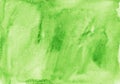 Watercolor light green background texture. Aquarelle kelly green color backdrop. Stains on paper Royalty Free Stock Photo