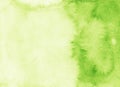 Watercolor light lime green color background texture. Stains on paper Royalty Free Stock Photo