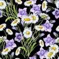 Watercolor meadow flowers on black background. Floral seamless pattern for design