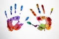 Multi-colored watercolor handprints