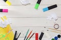 Watercolor and oil paints, brushes for painting, pencils, pastel crayon on white table. Top view. Flat lay. Royalty Free Stock Photo