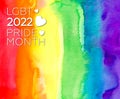 watercolor painted rainbow background with lgbt logo. Royalty Free Stock Photo