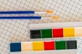 Watercolor paints and brushes for drawing on a sheet Royalty Free Stock Photo