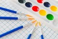 Watercolor paints and brushes for drawing on a sheet Royalty Free Stock Photo