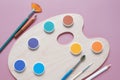 Watercolor paints, palette and paintbrushes Royalty Free Stock Photo