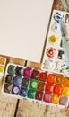 Watercolor paints, palette and paper Royalty Free Stock Photo