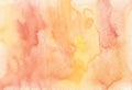 Watercolor pastel orange-yellow background texture. Watercolour peach color backdrop. Light coral color stains on paper, hand Royalty Free Stock Photo