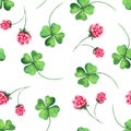 Watercolor pattern with clover, horseshoe and clover flowers.