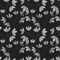 Watercolor seamless pattern with black and white leaf twigs, small leaves on a black background.
