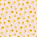 Watercolor seamless pattern with boiled eggs halfs on light pink background. Hand-drawn yellow yolk, creative food meal