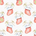 Watercolor seamless pattern with Christmas mice in red socks Royalty Free Stock Photo