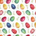 Watercolor seamless pattern with colored Easter eggs and spring plants. Royalty Free Stock Photo