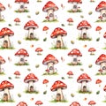 Watercolor seamless pattern with fairy-tale fly agaric mushroom houses and leaves isolated on white background. C Royalty Free Stock Photo