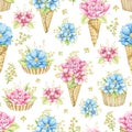 Watercolor seamless pattern with flowers in waffle cones and muffins