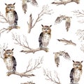 Watercolor seamless pattern with flying and sitting owls and branches.