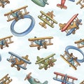 Watercolor seamless pattern with vintage airplanes on a light blue background Royalty Free Stock Photo