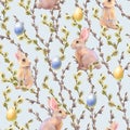 Watercolor seamless pattern with willow branches, rabbits and colorful eggs. Hand painted willow wood isolated on blue Royalty Free Stock Photo
