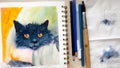 Watercolor sketch of black cat on paper. Aquarelle fluffy kitty in sketchbook. Hand drawn watercolour illustration of Royalty Free Stock Photo