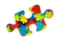 Watercolor sketch a day of disseminating information about autism, colorful puzzles within a large puzzle. April 2