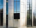 Watercolor of a sleek metal mailbox in front of a modern glass building