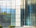 Watercolor of a sleek metal mailbox in front of a modern glass building