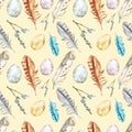 Watercolor spring seamless pattern with easter eggs, willow tree branches, assorted colorful feathers on yellow background.