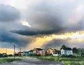 Watercolor of Street in the town with storm cloud in the background Royalty Free Stock Photo