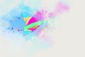 watercolor style abstract illustration of colorful kite flying in the blue sky. Royalty Free Stock Photo